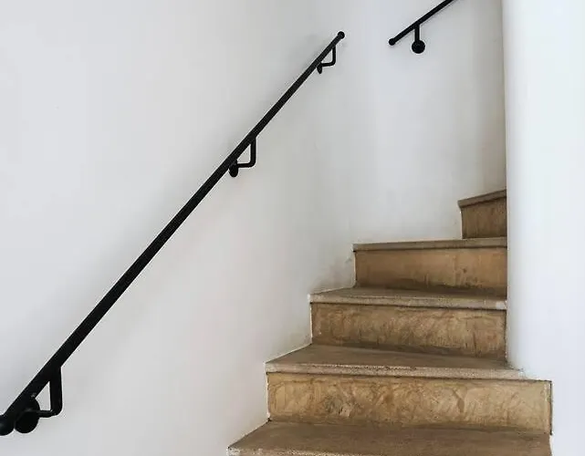 Breathtaking Beachfront House Дом отдыха Албуфейра